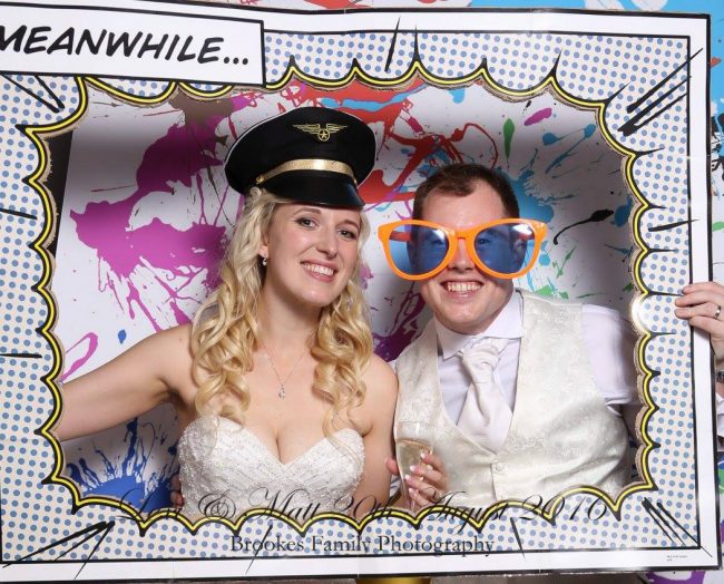 Real Wedding Blog Photobooth Bride and Groom