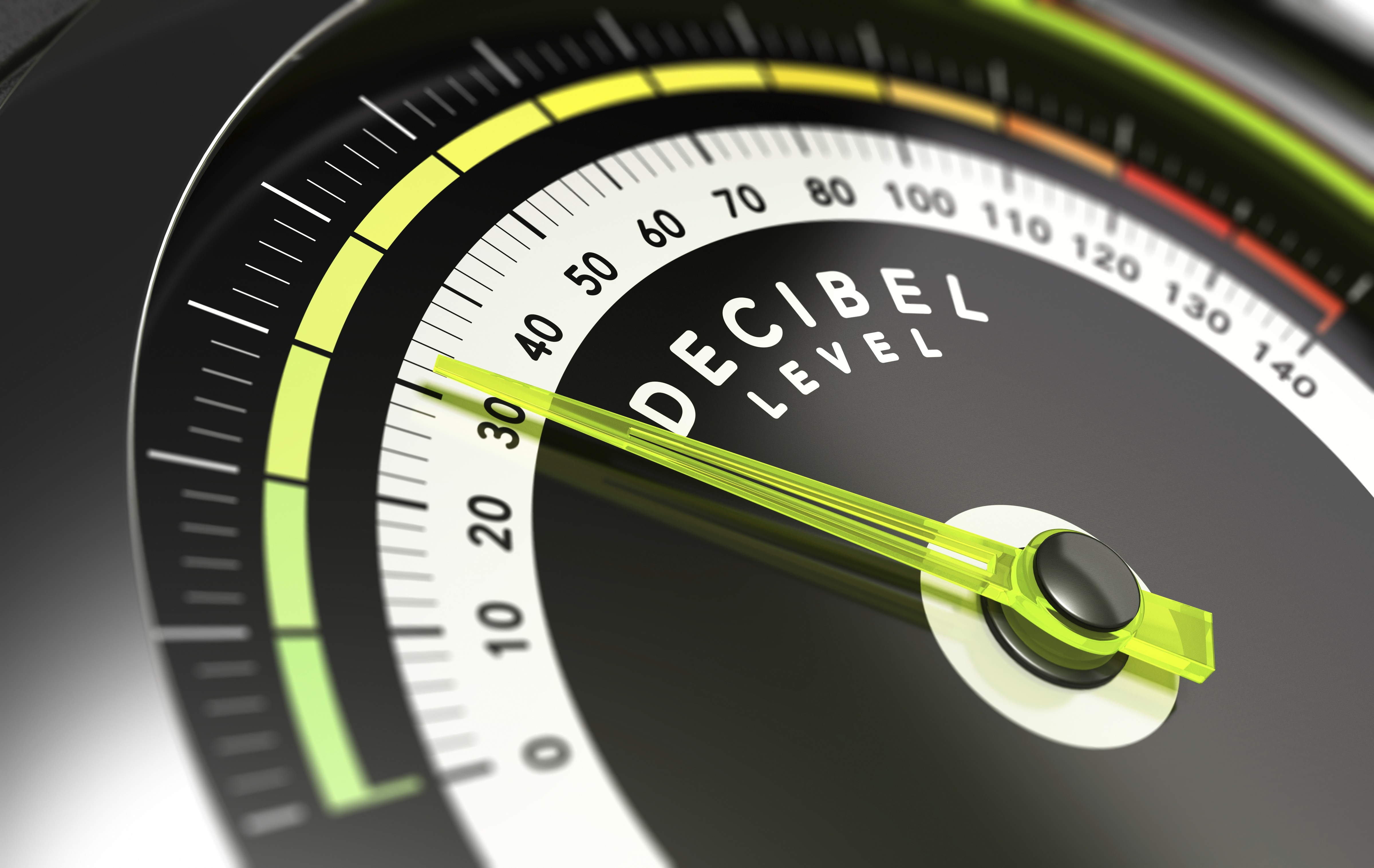 Decibel measurement. Gauge with green needle pointing 30 dB, concept of noise reduction