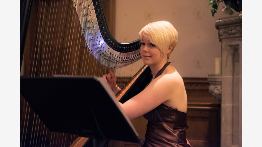 Lizzie The Harpist